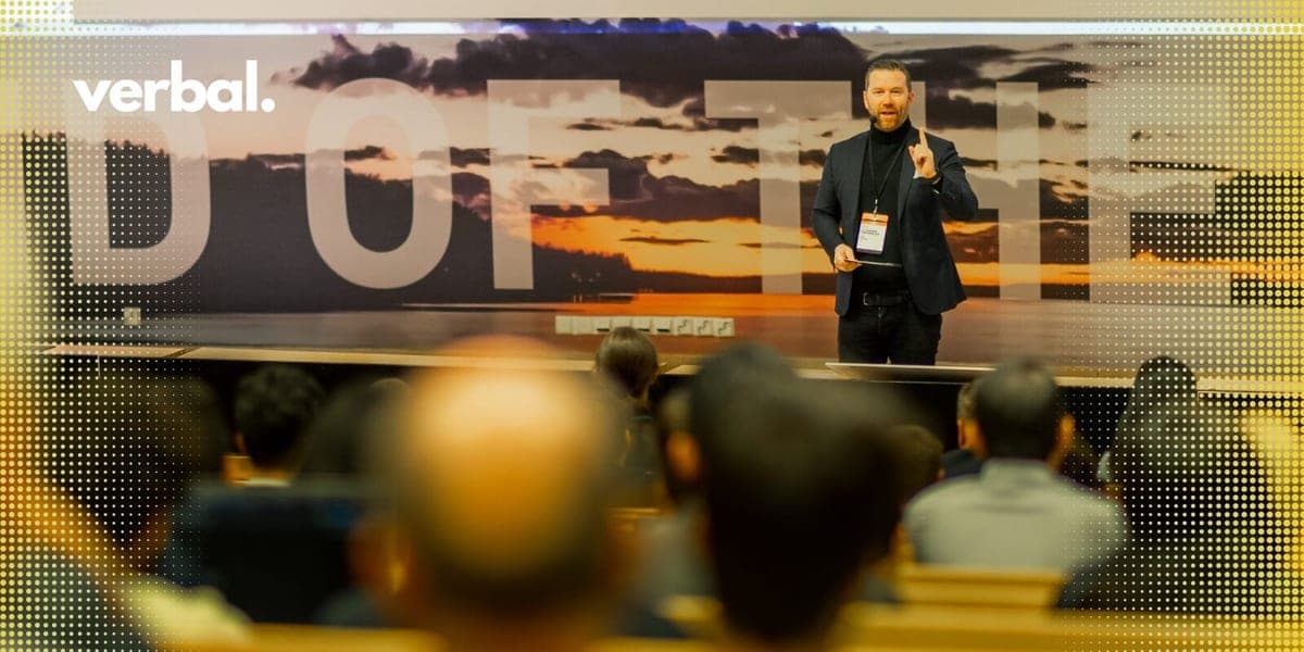Speaker delivering a keynote on stage at a Verbal event